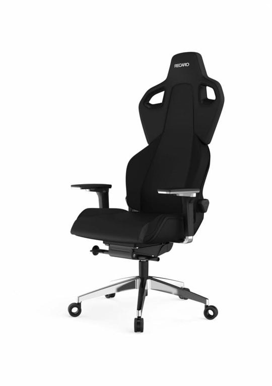 Der RECARO Exo Platinum von RECARO Gaming ist ein schwarzer ergonomischer Bürostuhl mit atmungsaktivem Stoff, verstellbaren Armlehnen, hoher Rückenlehne, Kopfstütze und einem stabilen fünfrädrigen Metallfuß mit speziellen Rollen, abgebildet vor weißem Hintergrund.