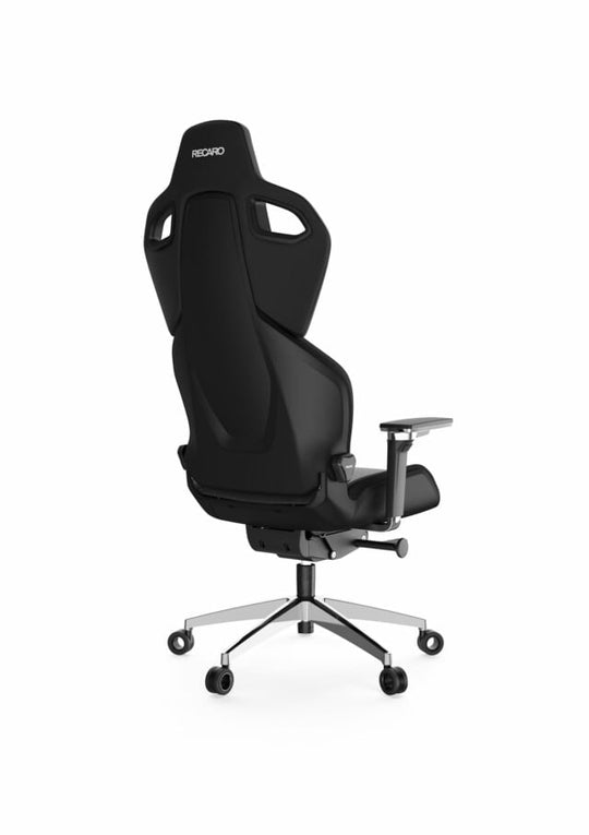 Der RECARO Exo Platinum von RECARO Shop ist ein eleganter schwarzer ergonomischer Bürostuhl mit hoher Rückenlehne, ausgeschnittener Kopfstütze, verstellbaren Armlehnen und einem fünfrädrigen Metallfuß mit Spezialrollen, von hinten vor weißem Hintergrund abgebildet.