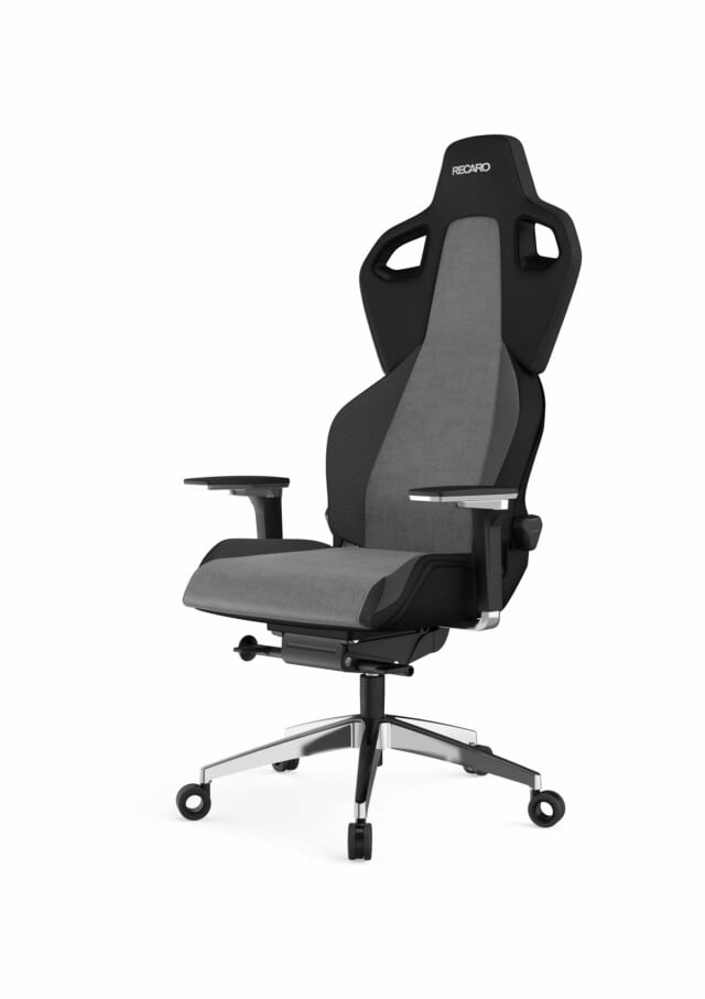 Der RECARO Exo Platinum von RECARO Shop ist ein moderner ergonomischer Bürostuhl mit hoher Rückenlehne, verstellbaren Armlehnen, grau-schwarzem Design, Spezialrollen, einem fünfrädrigen Metallfuß für Mobilität und atmungsaktiver Polsterung für Komfort.