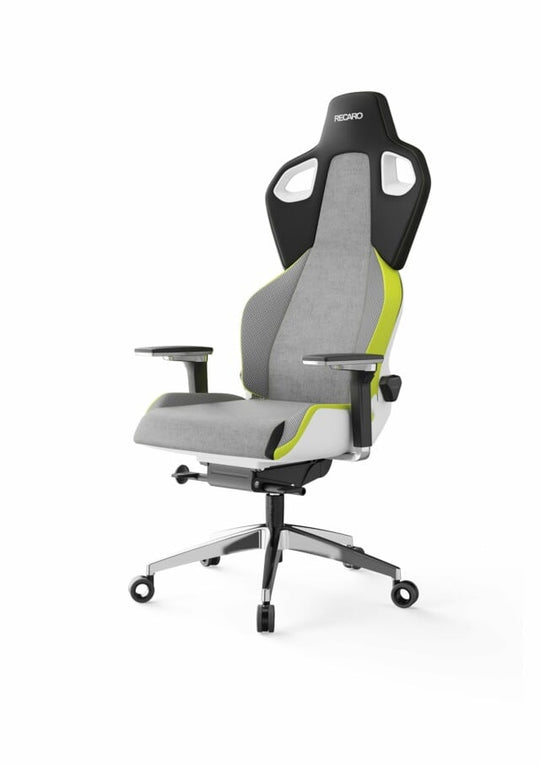 Der RECARO Exo Platinum von RECARO Shop ist ein moderner ergonomischer Bürostuhl in Grau mit grünen Akzenten, schwarzen Details und einer Markenkopfstütze. Er verfügt über eine hohe Rückenlehne, verstellbare Armlehnen, Spezialrollen für sanfte Beweglichkeit und atmungsaktive Stoffe für Komfort.